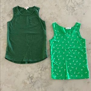 Pair of green tanks: Solid pocket, white flowers